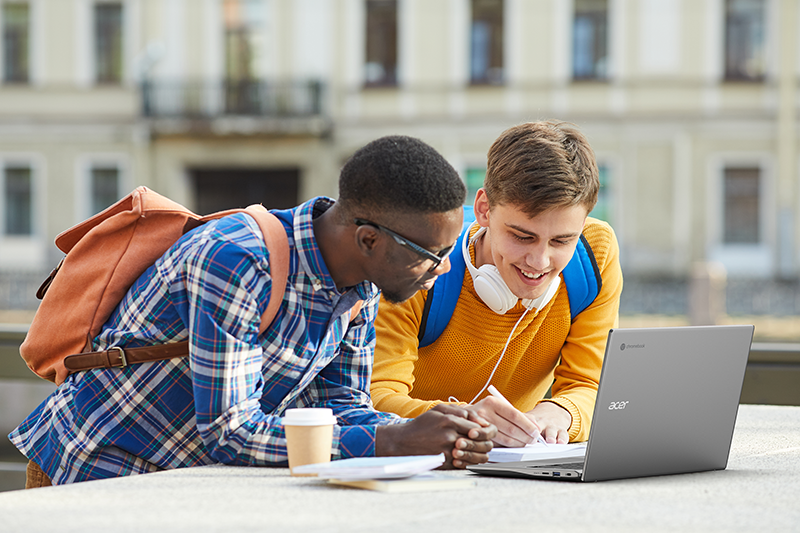 Students working on an Acer laptop